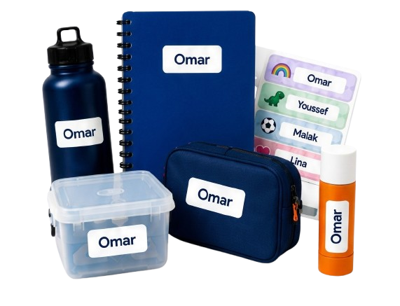 Labeled bottle, notebook, pouch, lunchbox and glue stick